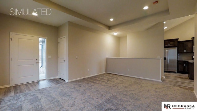 entryway featuring carpet flooring