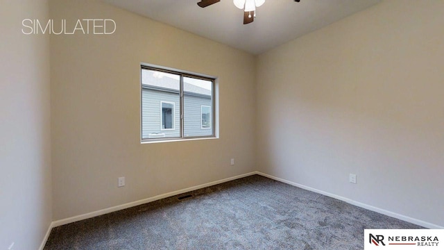 carpeted spare room featuring ceiling fan