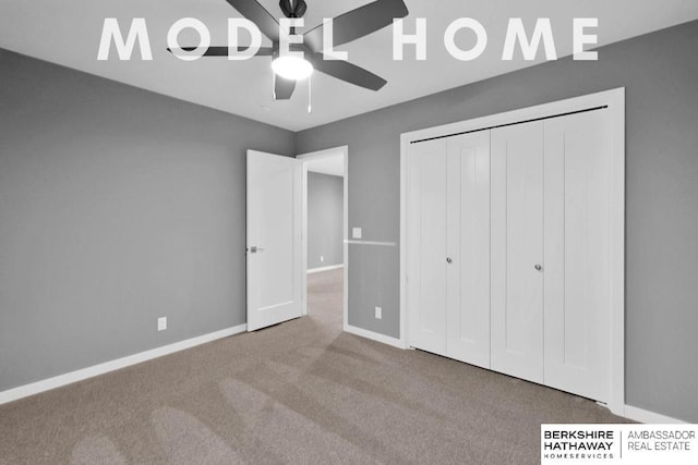 unfurnished bedroom with light colored carpet, a closet, and ceiling fan