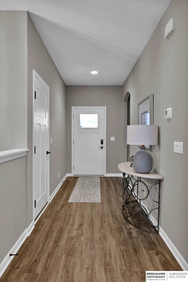 entrance foyer featuring hardwood / wood-style floors