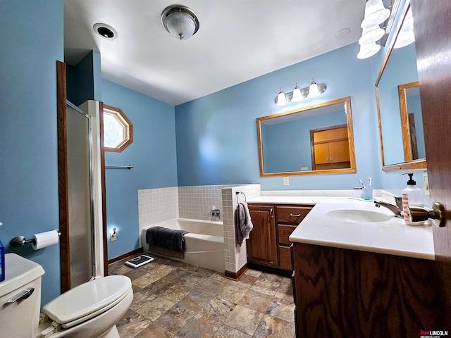 full bathroom with double vanity, plus walk in shower, toilet, and tile patterned floors