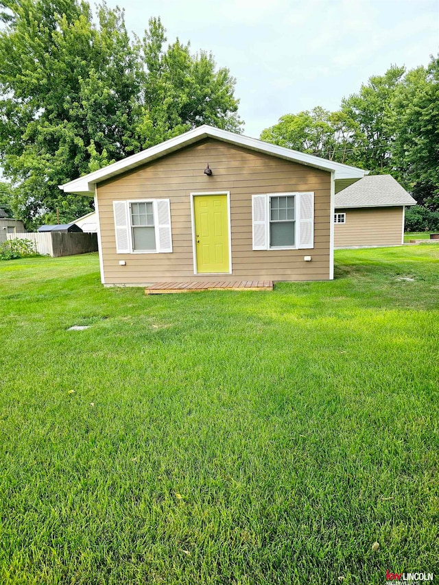 ranch-style house with a front yard