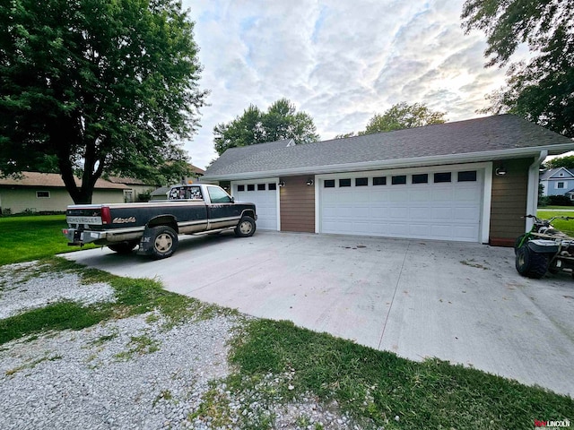 single story home featuring a garage