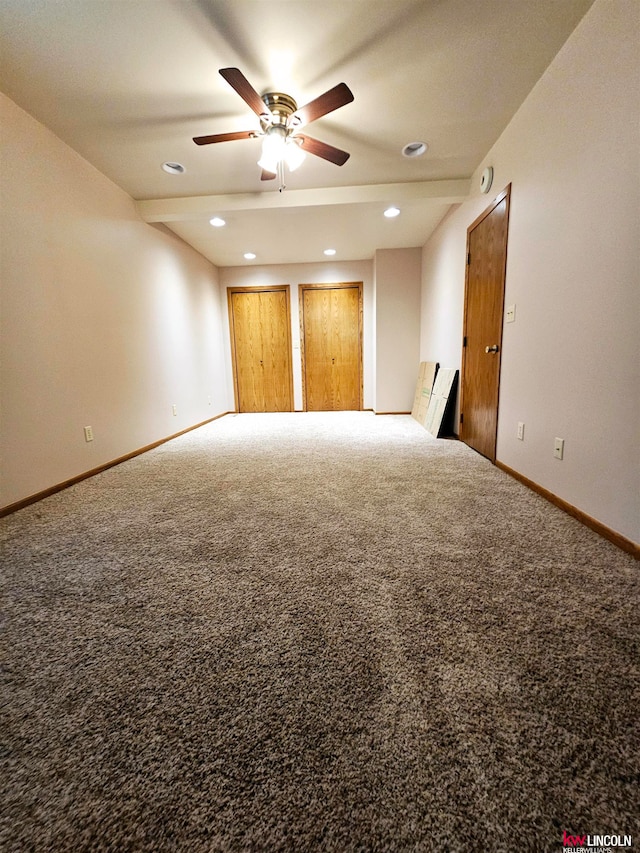 carpeted empty room featuring ceiling fan