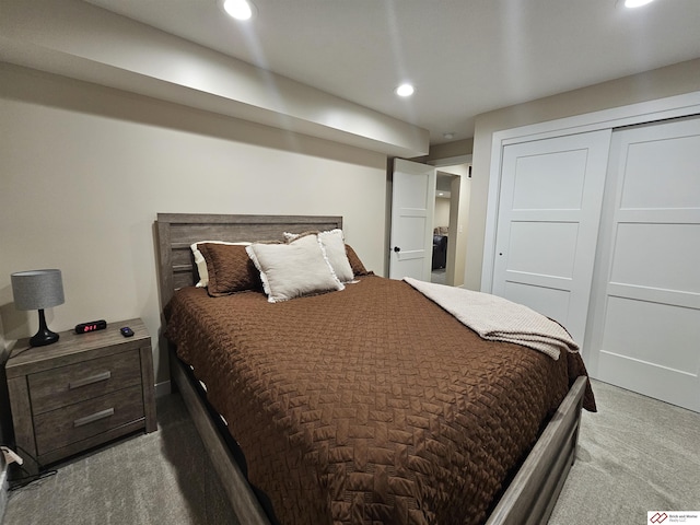 carpeted bedroom with a closet