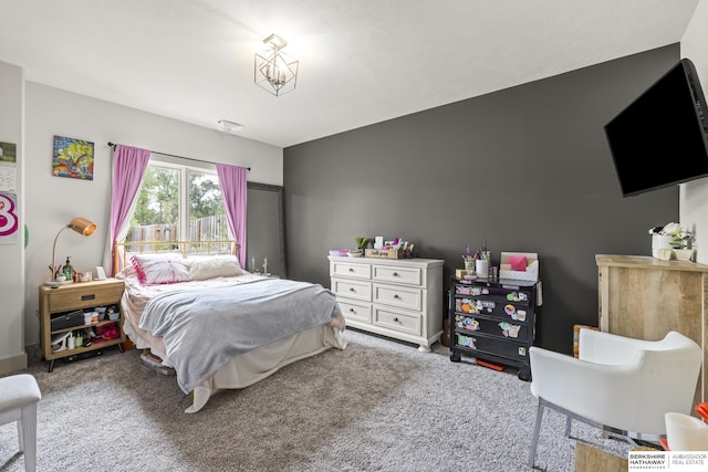 bedroom featuring carpet