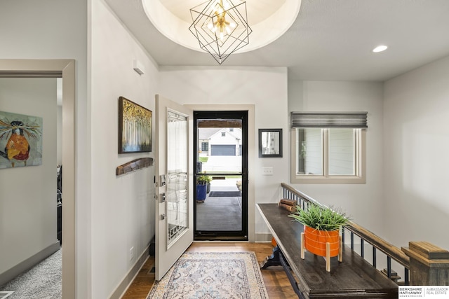 entryway with an inviting chandelier