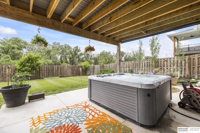 view of patio with a hot tub