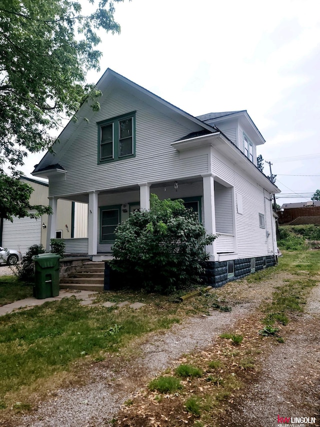 view of front of home featuring covered porch