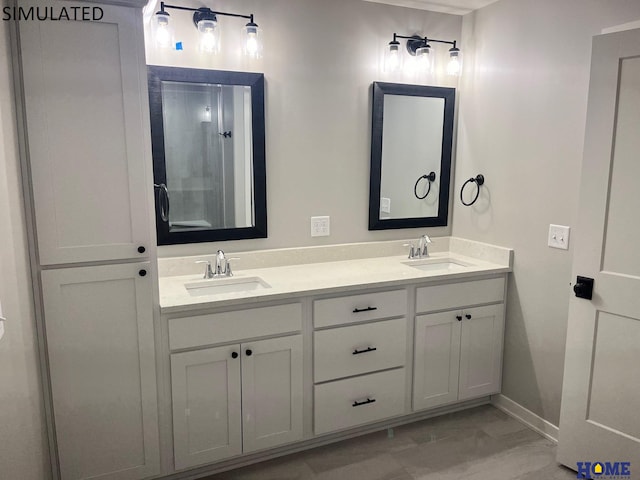 bathroom with tile patterned flooring and dual bowl vanity