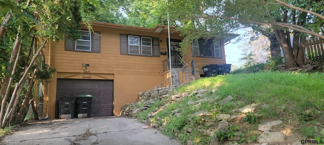 exterior space with a garage