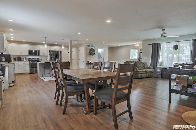 dining space featuring recessed lighting, visible vents, and light wood-style flooring