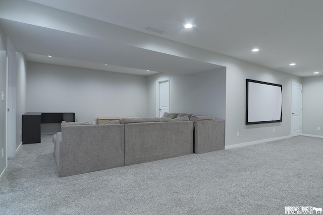 cinema featuring light carpet, baseboards, visible vents, and recessed lighting