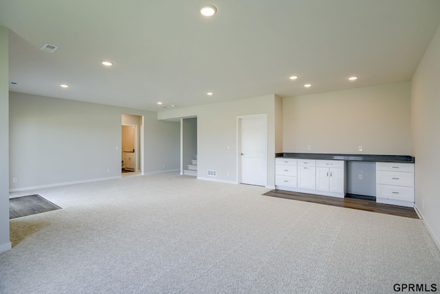 interior space featuring carpet flooring