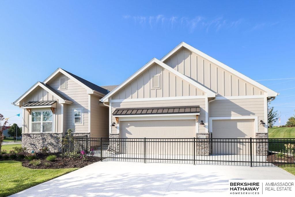 craftsman inspired home with a garage