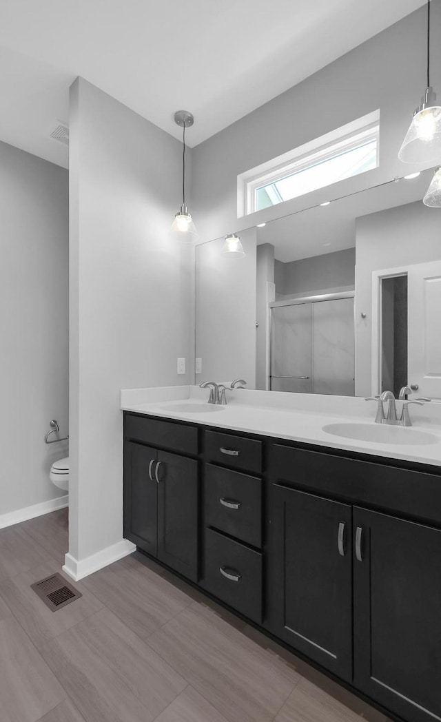 10210 S 110th Ave, Papillion, NE 68046 - full bathroom with double vanity and an enclosed shower