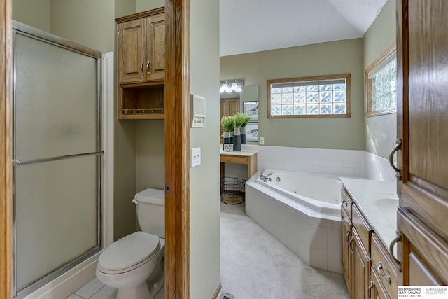 full bathroom with vanity, toilet, and separate shower and tub