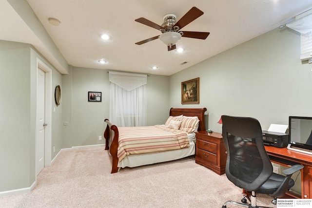 carpeted bedroom with ceiling fan