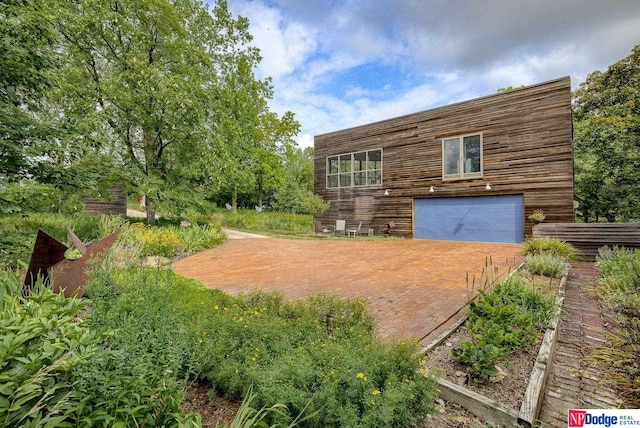 exterior space featuring a garage