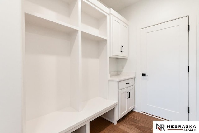 mudroom with wood finished floors