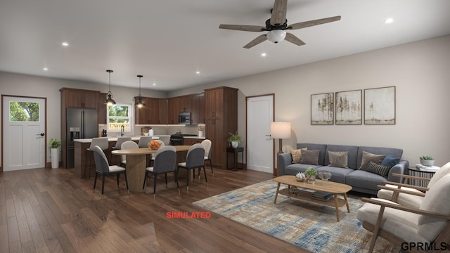 living room with sink, ceiling fan, and dark hardwood / wood-style floors