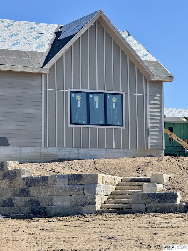 view of side of property featuring board and batten siding