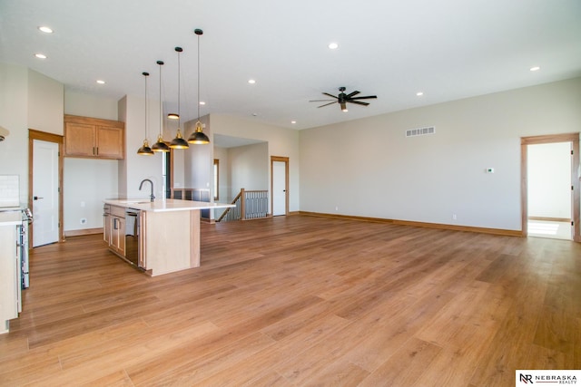 325 S Lakeview Way, Ashland, NE 68003 - kitchen featuring dishwasher, light countertops, ceiling fan, open floor plan, and recessed lighting