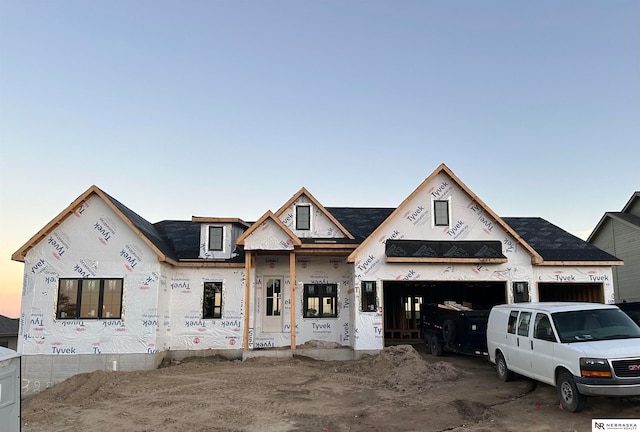 property in mid-construction with a garage