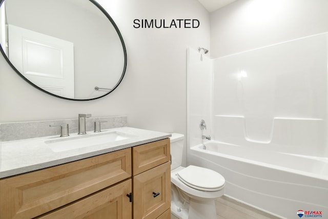 bathroom featuring vanity, toilet, and shower / bathtub combination