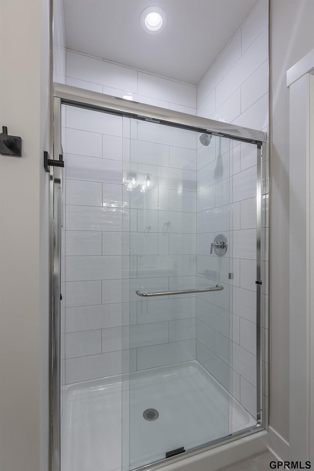 bathroom with a stall shower