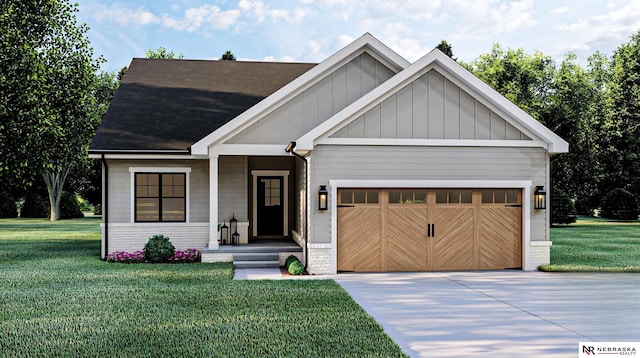 view of front of house featuring a front lawn and a garage