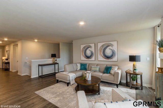 living room with dark hardwood / wood-style floors