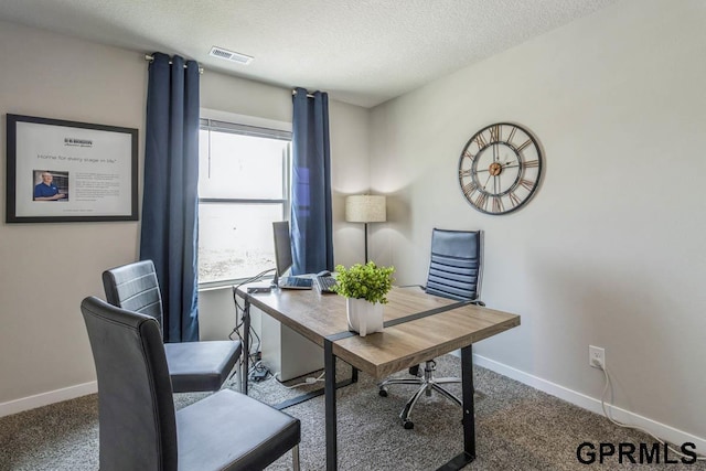 home office featuring carpet flooring, baseboards, and visible vents