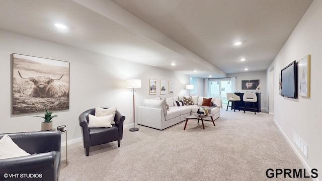 living room featuring light colored carpet