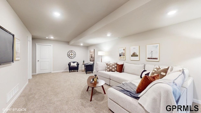 living room featuring light colored carpet