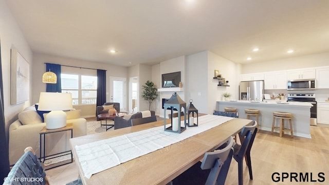 dining area featuring light hardwood / wood-style flooring