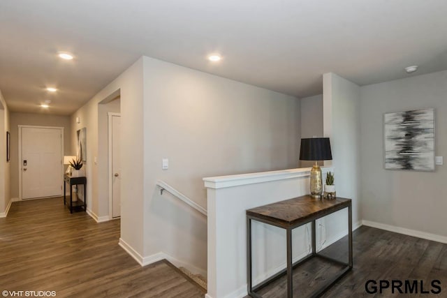 hall featuring dark wood-type flooring