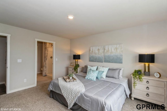 bedroom with light carpet