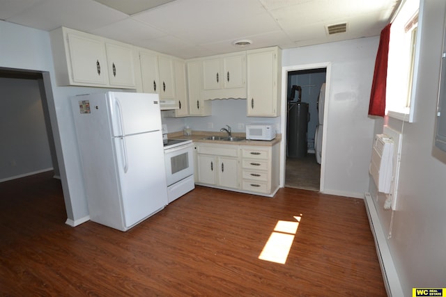 kitchen with dark hardwood / wood-style floors, white appliances, range hood, sink, and white cabinets