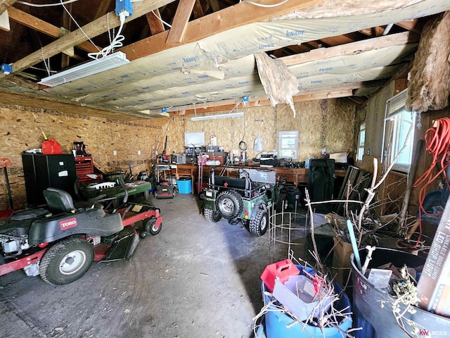 garage with a workshop area