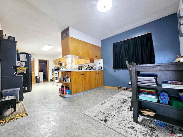 kitchen featuring a textured ceiling