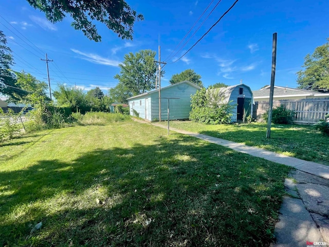 view of yard with a storage shed