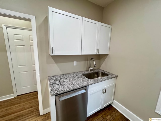 kitchen with white cabinetry, dishwasher, light stone counters, and sink