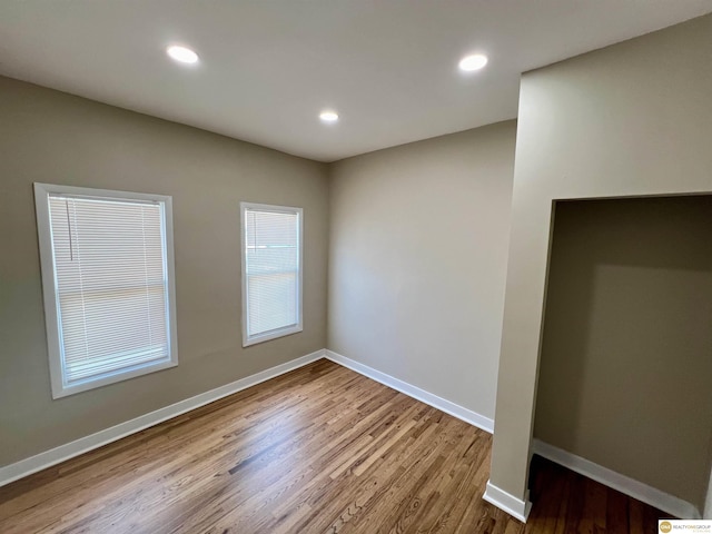 unfurnished room featuring light hardwood / wood-style flooring