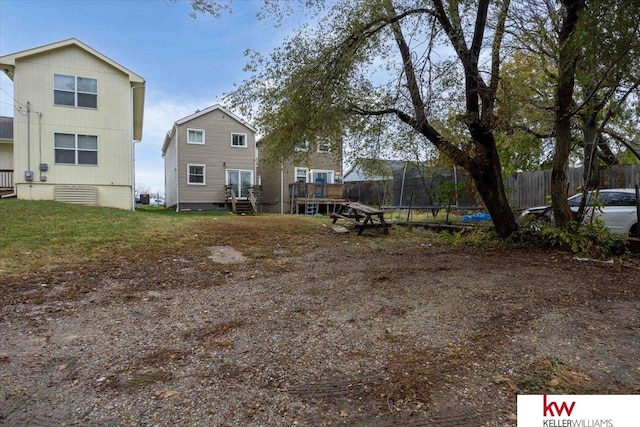 view of yard featuring a trampoline