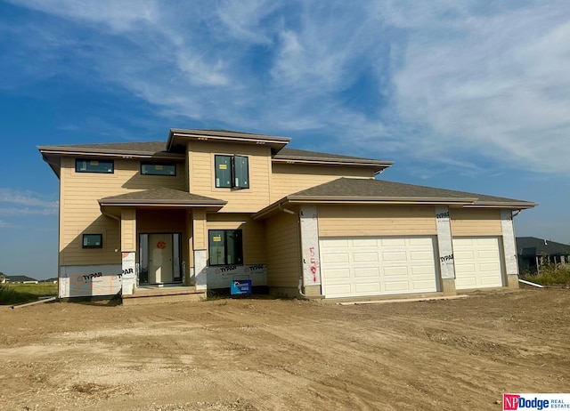 prairie-style house with a garage