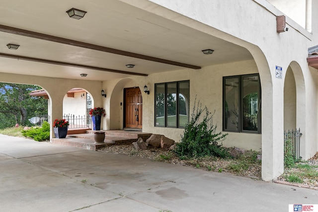 doorway to property with a porch