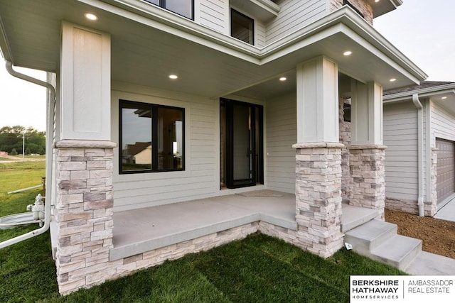 entrance to property with covered porch