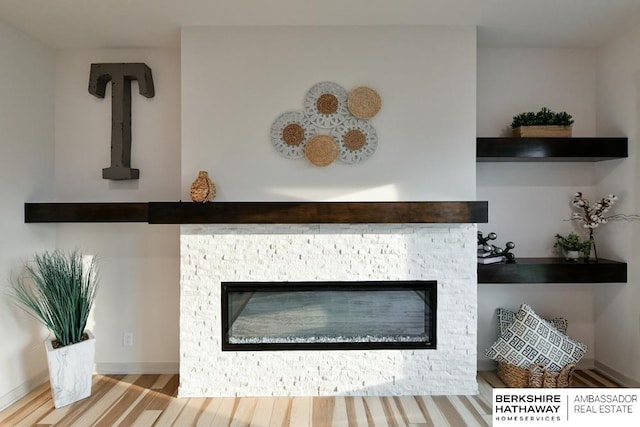 interior space featuring a fireplace and hardwood / wood-style floors