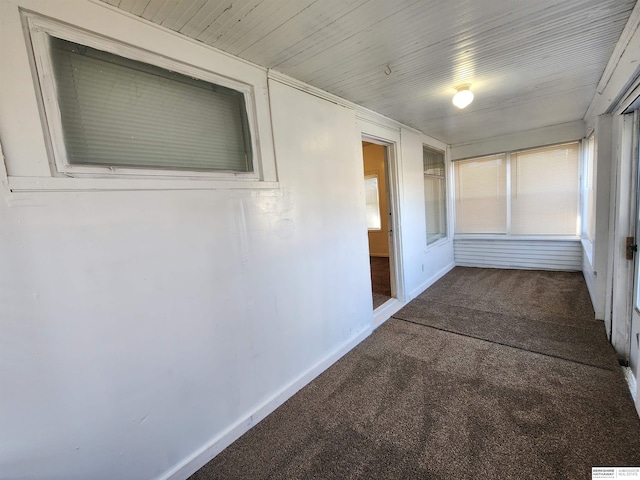 hall with carpet floors